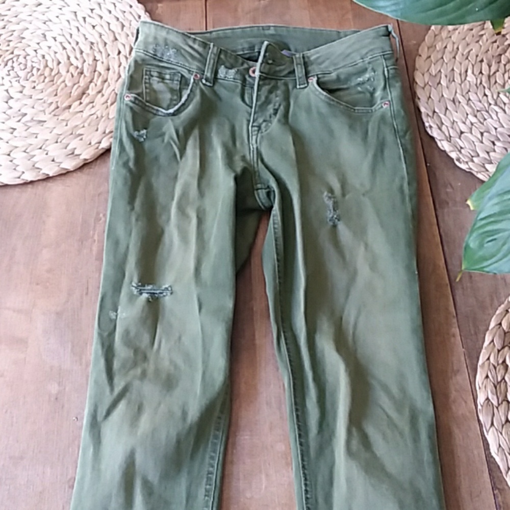 H and M Divided brand olive green distressed skinn